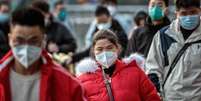 China relaxou restrições contra Covid após rara onda de protestos  Foto: EPA / Ansa - Brasil